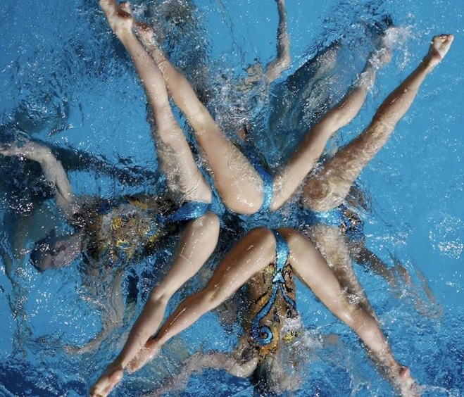 Synced Laughter: Hilarious Moments in Synchronized Swimming